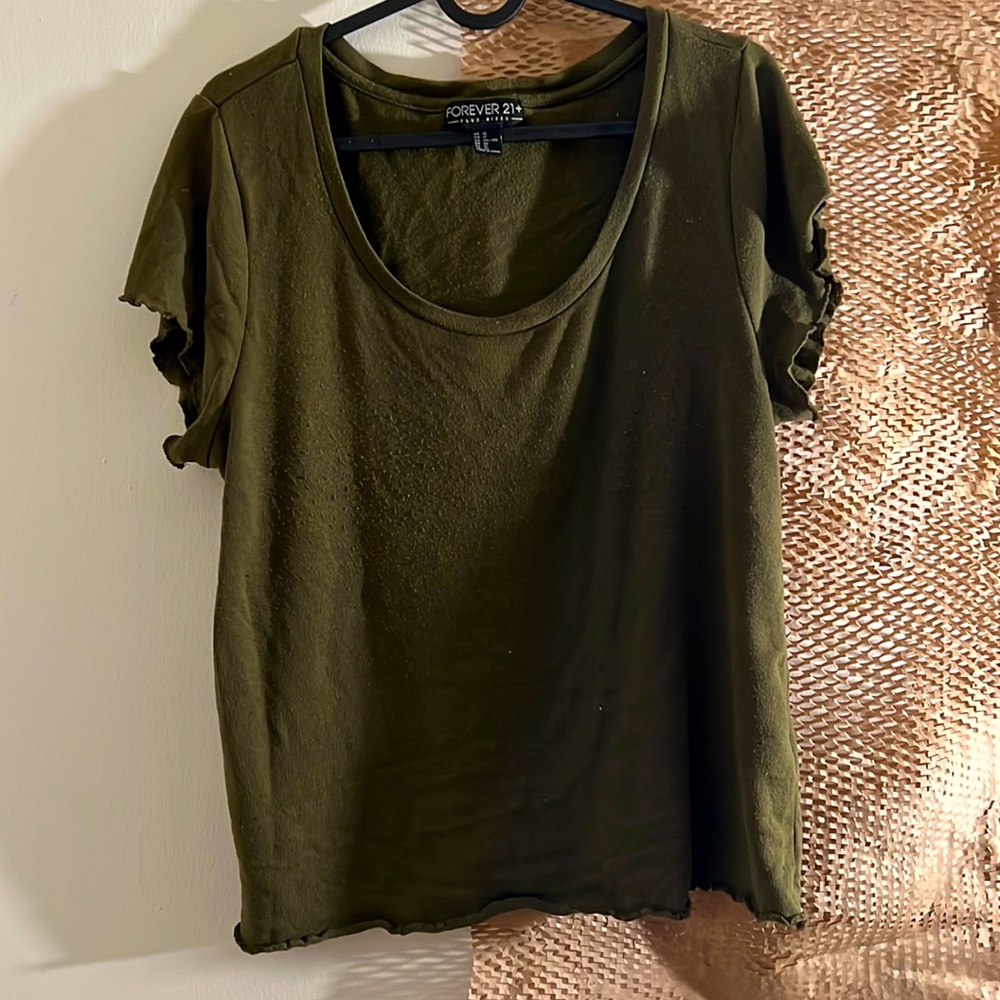 Short sleeve top with curled ends on sleeves and bottom